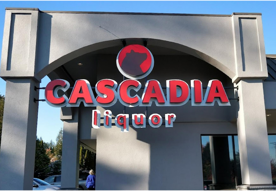 Sign for Cascadia Liquor in Nanoose Bay featured on a concrete arch.